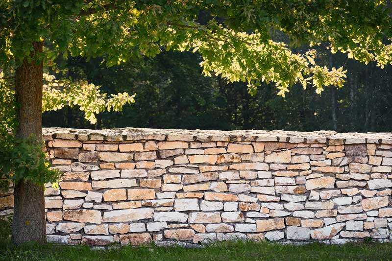 shutterstock_1701689065 boundary stone wall construction