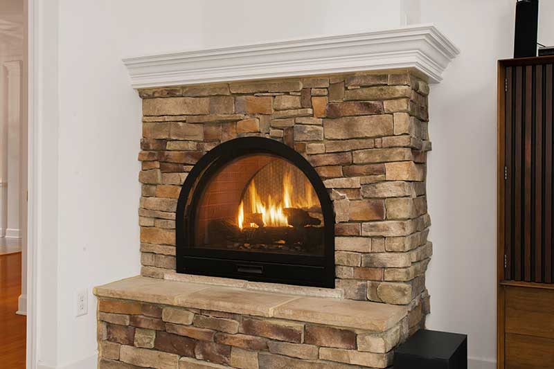 shutterstock_1701689065 indoor stone fireplaces