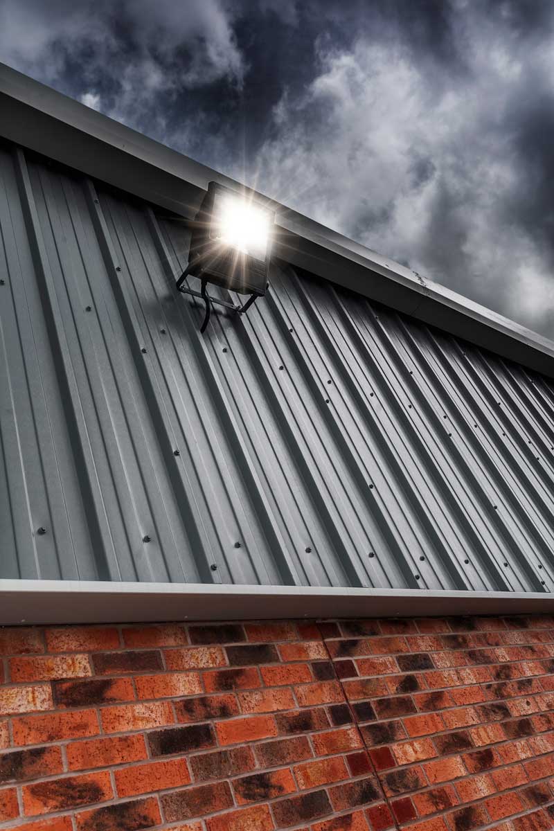 shutterstock_1701689065 outdoor motion sensor lighting installation