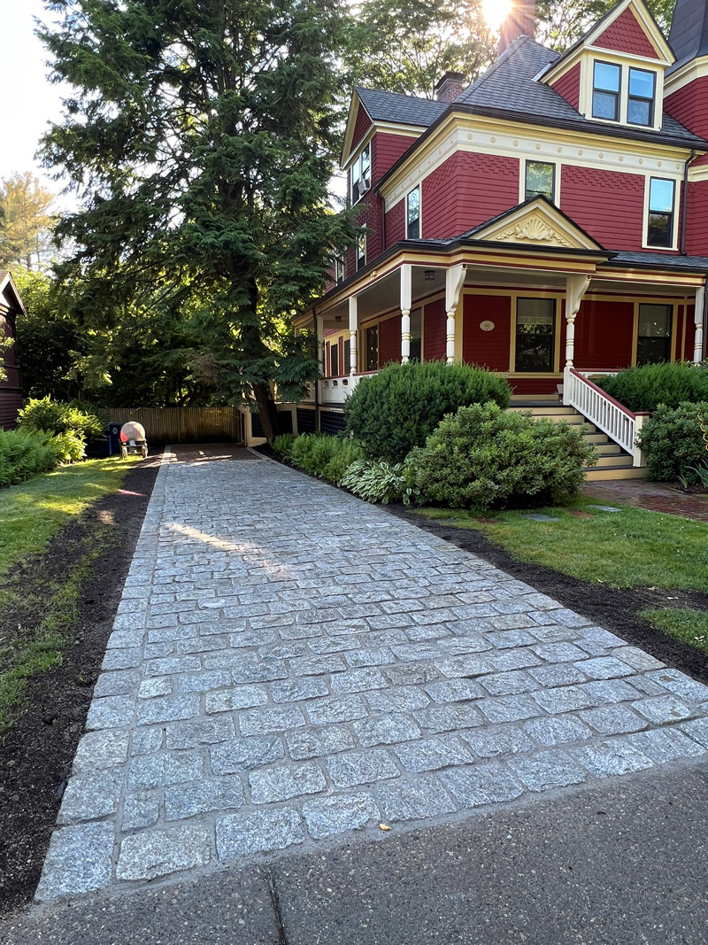 shutterstock_1701689065 sidewalk installation stamped concrete walkways